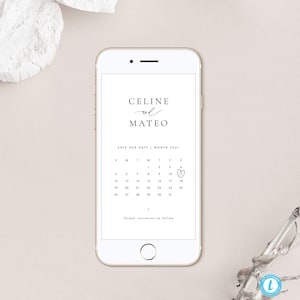 May include: A white smartphone screen with a save the date announcement for Celine and Mateo. The announcement includes a calendar with a heart marking the date of the wedding in the month of 2021. The text "formal invitation to follow" is at the bottom of the screen.