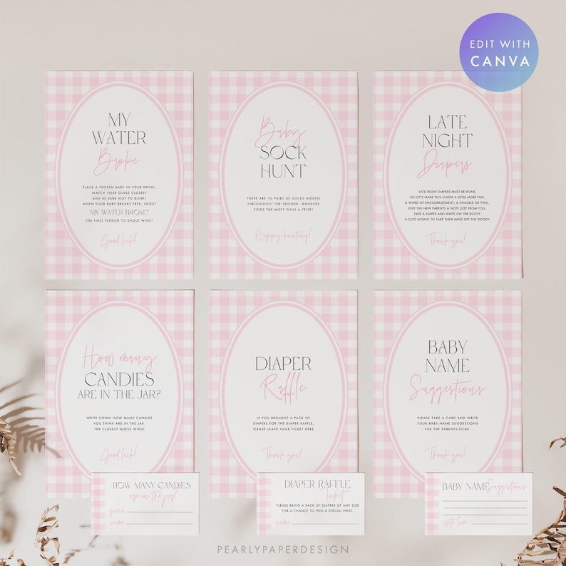 May include: A collection of baby shower game signs in pink and white gingham, featuring oval frames and elegant script. Games include "My Water Broke," "Baby Sock Hunt," and "Late Night Diaper." Includes matching game cards.