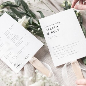 May include: A wedding ceremony program fan with a white background and black text. The fan features the names "Stella & Ryan" and the date "8 August 2020". The text "Welcome to our wedding" is written in cursive at the top of the fan.
