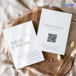 May include: A white wedding invitation with black text. The invitation reads "Amelia & William" with the words "Forever and Ever" in a circle above the names. The invitation also includes the date, time, and location of the wedding. A separate white card with black text reads "Kindly RSVP by August 1, 20xx" and includes a QR code.