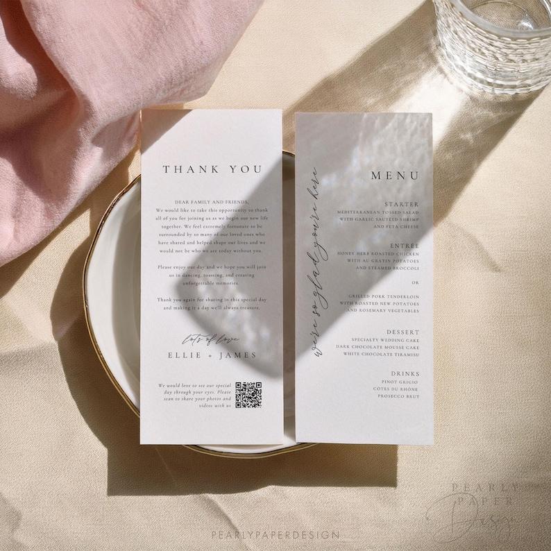 May include: Two white cards with a thank you message and a wedding menu. The thank you card has the text "Thank You" and "Dear Family and Friends" and the text "Lots of Love" with the names "Ellie & James". The menu card has the text "We're so glad you're here" and "Menu" with a list of food and drink options.