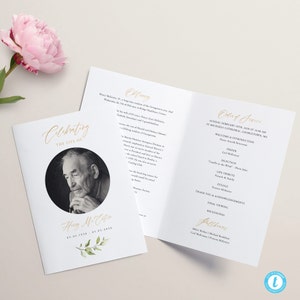 May include: A funeral program with a gold and white design. The front cover features a black and white photo of a man with the text "Celebrating the Life of Harry McEntire 05.05.1926 - 01.07.2020". The back cover includes the order of service for the funeral, which will be held on Sunday, February 14th, 2020 at 10:00 AM at St. Michael's Cathedral in Georgetown, MA.