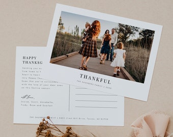 May include: A Thanksgiving postcard with a photo of a family of five walking on a wooden path. The text on the postcard reads "Happy Thanksgiving" and "Thankful, The Saunders Family 2020".