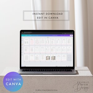 May include: A laptop screen showing a digital document with multiple pages. The screen displays text and images in a light pink and white colour scheme. Text on the screen includes "Instant Download" and "Edit in Canva". The laptop is on a concrete surface.