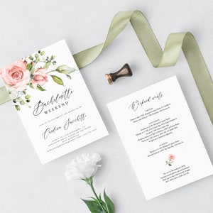 May include: A white invitation suite for a bachelorette weekend. The main invitation features pink roses and greenery, with the text "Bachelorette Weekend" and the bride's name. A second card lists weekend events. A green ribbon and a wax seal are also present.