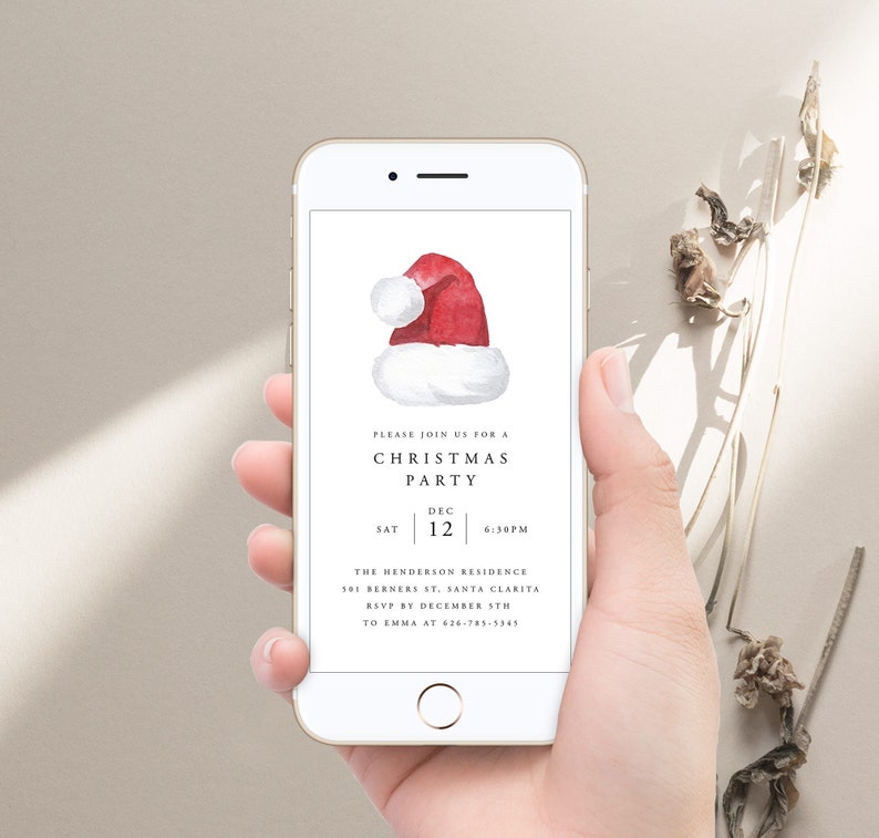 May include: A smartphone screen displaying a Christmas party invitation with a red and white Santa hat illustration. The invitation reads "Please join us for a Christmas Party, Sat Dec 12, 6:30pm, The Henderson Residence, 101 Berners St, Santa Clarita, RSVP by December 5th to Emma at 626-785-5345."