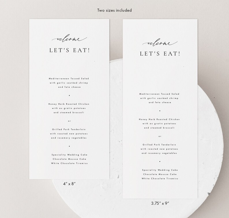 May include: Two printable wedding reception menu cards with a minimalist design. The cards are white with black text and feature the phrase "Welcome, Let's Eat!" at the top. The menu includes Mediterranean Tossed Salad, Honey Herb Roasted Chicken, Grilled Pork Tenderloin, and a selection of wedding cakes. The cards are available in two sizes: 4 inches by 8 inches and 3.75 inches by 9 inches.