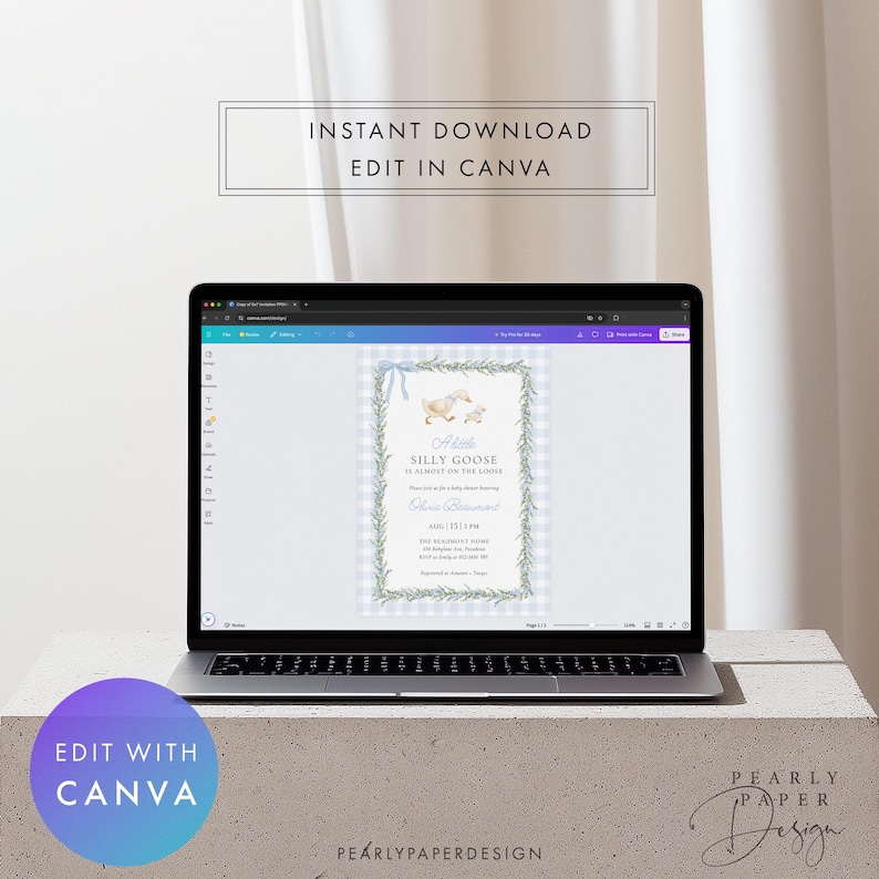 Peut inclure: Un ordinateur portable affiche une invitation &agrave; une baby shower avec une bordure vichy bleue et une illustration d'oie &agrave; l'aquarelle. Le texte indique "A Little Silly Goose" et "Edit in Canva". L'ordinateur est sur une surface en b&eacute;ton.