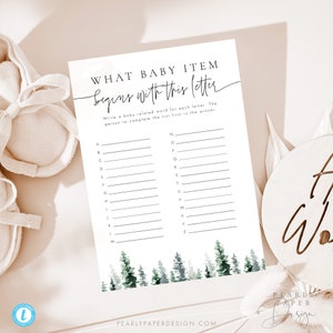 May include: A printable baby shower game with a white background and green trees at the bottom. The game is called "What Baby Item Begins With This Letter." The game asks players to write a baby-related word for each letter of the alphabet.