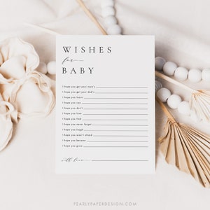 Może przedstawiać: Drukowana karta gry na baby shower z tekstem "WISHES for BABY" i listą życzeń dla dziecka, takich jak "Mam nadzieję, że będziesz mieć mamę", "Mam nadzieję, że będziesz mieć tatę", "Mam nadzieję, że się nauczysz", "Mam nadzieję, że będziesz m&oacute;gł", "Mam nadzieję, że tego nie zrobisz", "Mam nadzieję, że będziesz kochać", "Mam nadzieję, że znajdziesz", "Mam nadzieję, że nigdy nie zapomnisz", "Mam nadzieję, że będziesz się śmiać", "Mam nadzieję, że nie będziesz się bać", "Mam nadzieję, że się staniesz", "Mam nadzieję, że będziesz rosnąć", i "z miłością".