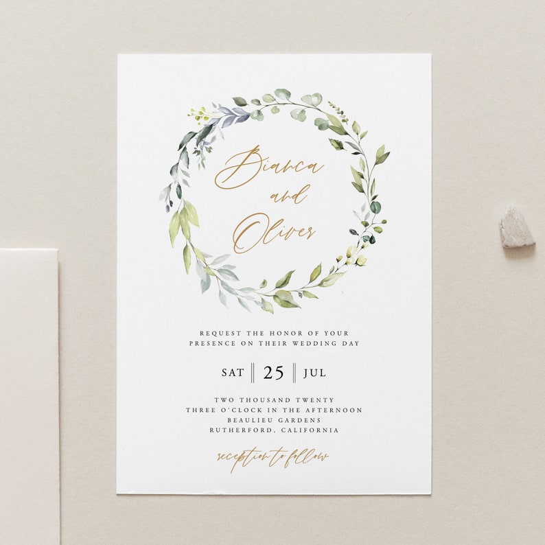 May include: Wedding invitation with a watercolor wreath of green leaves and white flowers. The text reads "Bianca and Oliver" in gold script. The date is Saturday, July 25th, 2020 at 3:00 PM at Beaulieu Gardens in Rutherford, California. The invitation also states "Reception to follow."