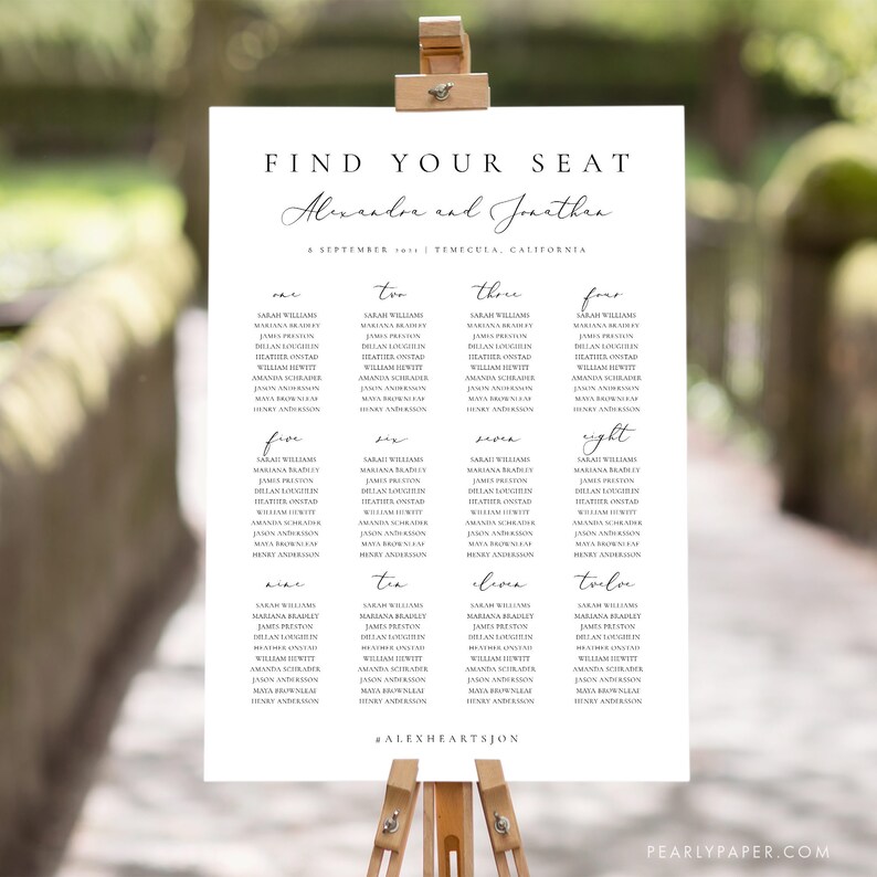 May include: A wedding seating chart with a white background and black text. The chart is titled "Find Your Seat" and lists the names of guests at tables numbered one through twelve. The chart also includes the names of the bride and groom, "Alexandre and Jonathan", and the date and location of the wedding.
