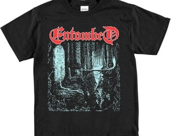 May include: Black t-shirt with a graphic print of a tombstone and the text "Entombed" in red.