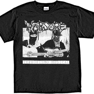 May include: Black t-shirt with a white graphic print of a band called "WARSORE" playing guitars. The text "TERRORISMO MUSICAL" is printed below the band image.