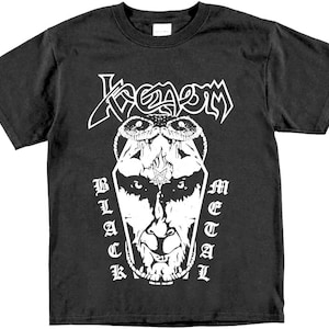 May include: Black t-shirt with a white graphic of a skull with horns and the text "Venom Black Metal".