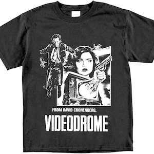 May include: Black t-shirt with a white graphic of a man and woman from the movie Videodrome. The text "From David Cronenberg, Videodrome" is printed below the graphic.