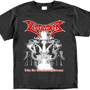 May include: Black t-shirt with a red "Dismember" logo and a white graphic of a skull and other imagery. The text "Like An Overflowing Stream" is printed below the graphic.