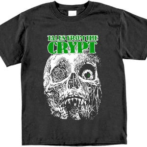May include: Black t-shirt with a white skull graphic and green text that reads "Tales from the Crypt".