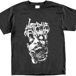 May include: Black t-shirt with a white graphic of a screaming face with the text "Mayhem of Humanity" above it.