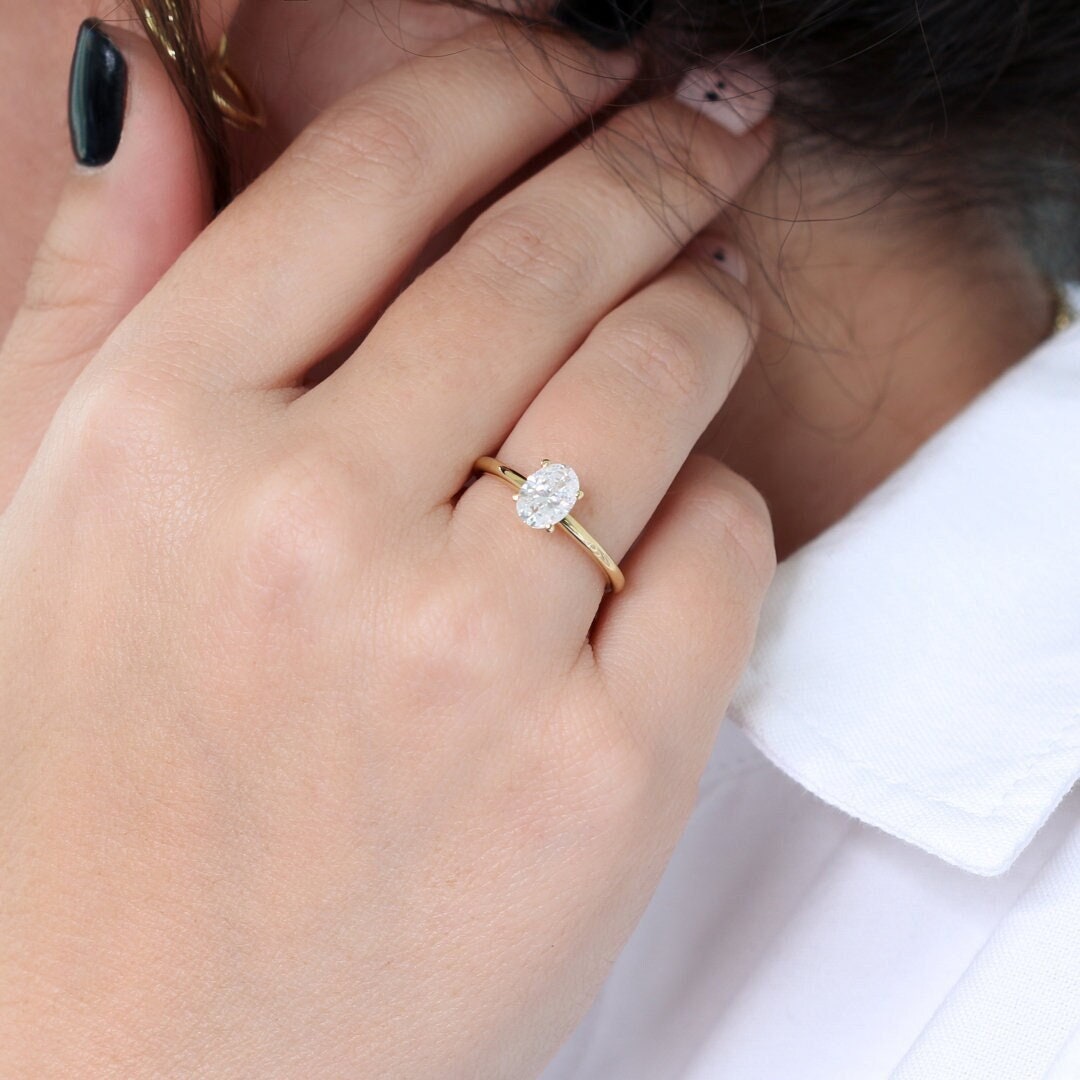 Oval engagement ring on sale thin gold band