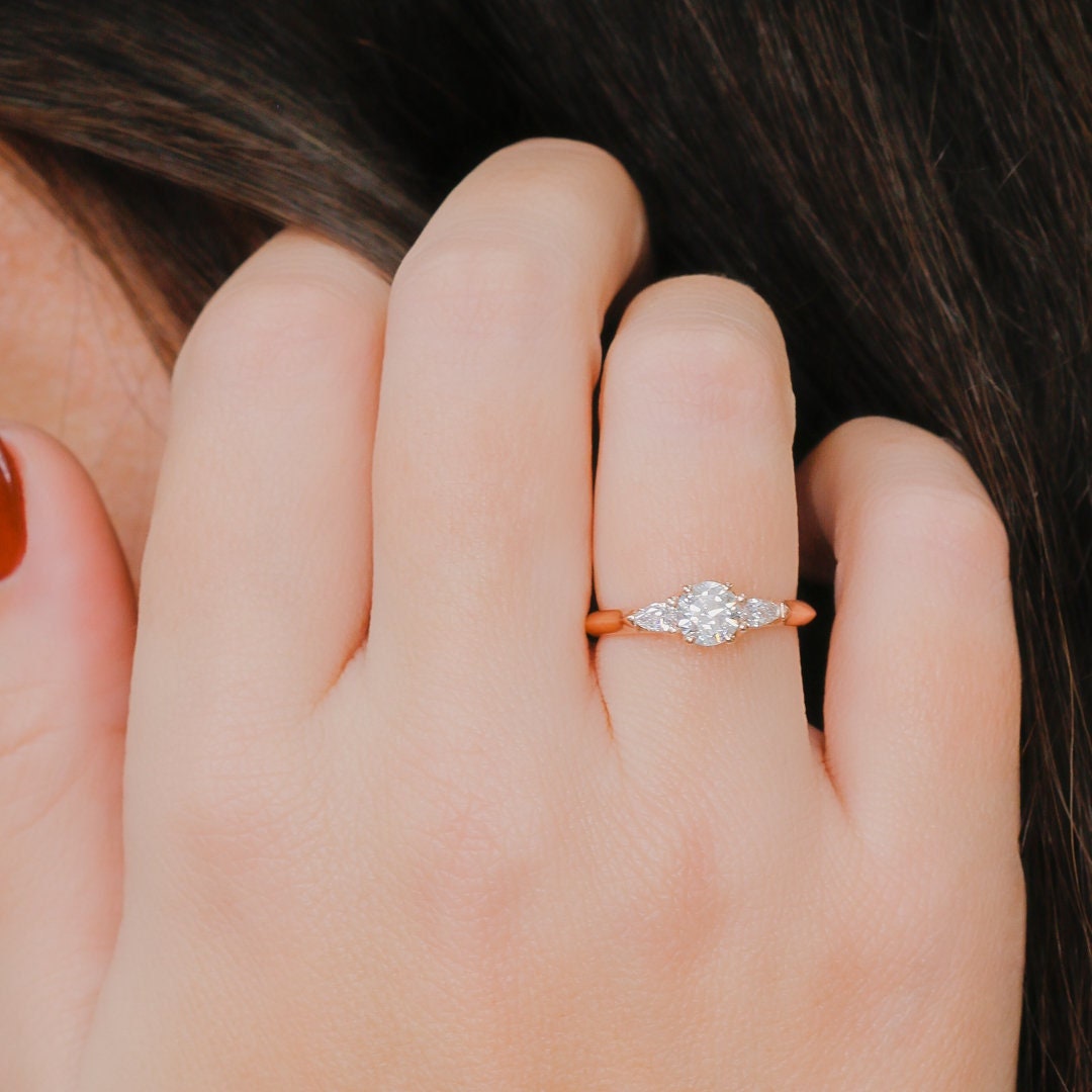 Simple 3 diamond engagement best sale rings
