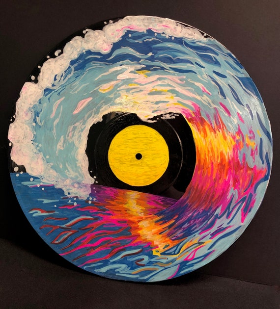 Sun and wave painted on record