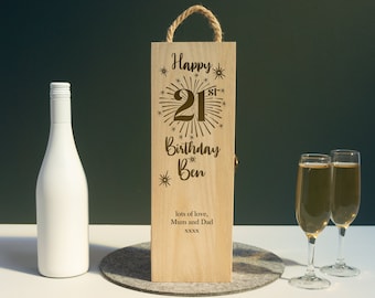 May include: A wooden wine box with a personalized message for a 21st birthday. The box is engraved with "Happy 21st Birthday Ben" and "lots of love, Mum and Dad XXXX".