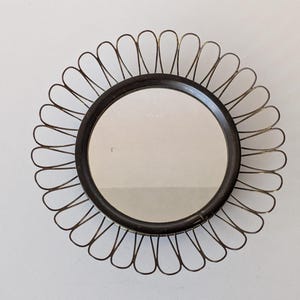 May include: A rustic wooden sign with the text "Welcome to our home" in white lettering. The sign features a distressed finish and a simple, inviting design, perfect for entryway decor.