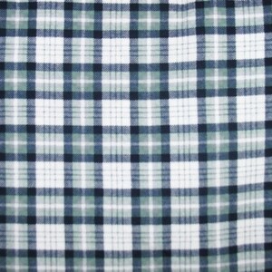 May include: White fabric with a blue and green plaid pattern.