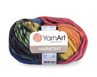 May include: A skein of YarnArt Harmony yarn in colour A7. The yarn is a multi-coloured blend of red, orange, yellow, green, blue, and black.