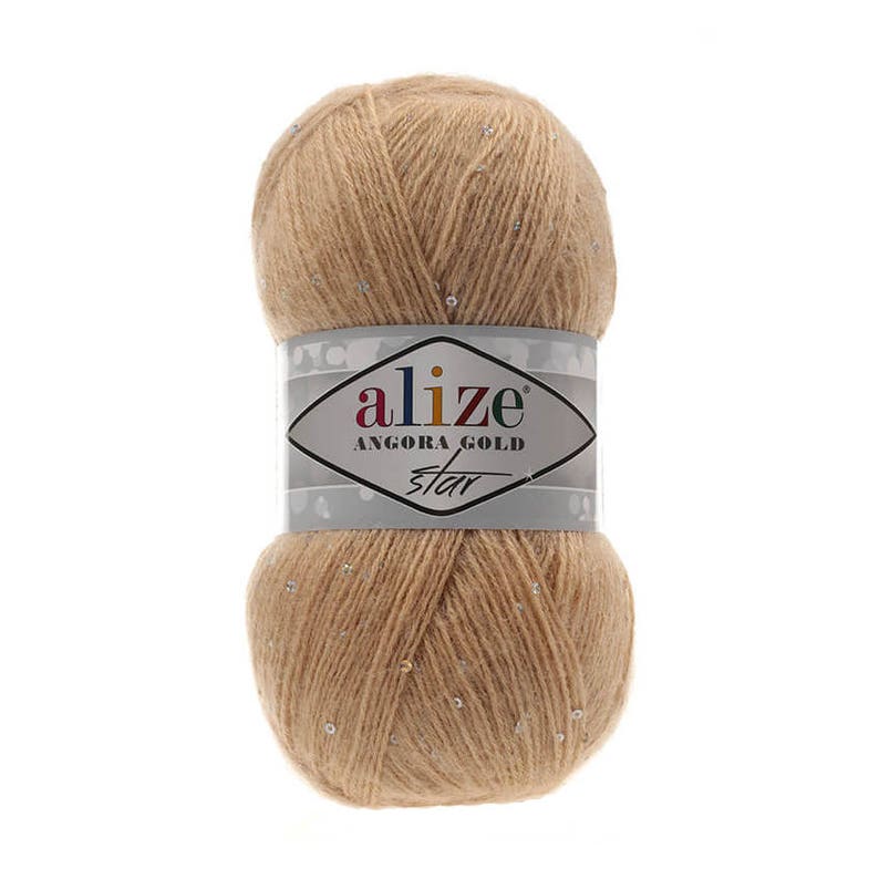 May include: A skein of beige yarn with silver glitter, labeled "alize Angora Gold Star"