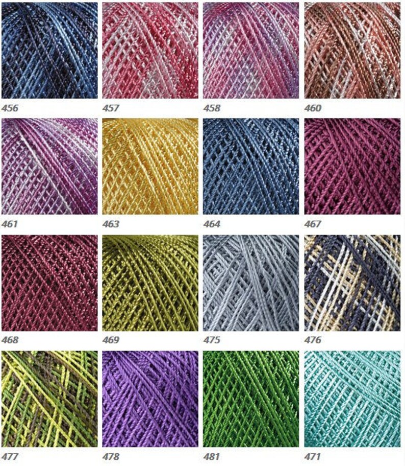 May include: A collection of 12 skeins of metallic yarn in various colors, including blue, pink, gold, green, purple, and silver. Each skein is wound into a ball shape and has a label with a number.