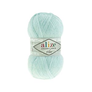 May include: A skein of light blue yarn with silver glitter. The yarn is labeled "Alize Angora Gold Star."