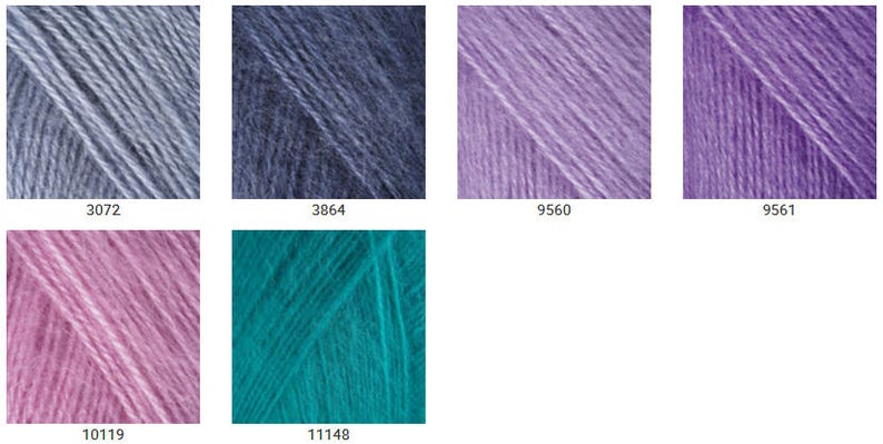 May include: Six yarn skeins in different colors: light blue, dark blue, light purple, dark purple, pink, and teal.