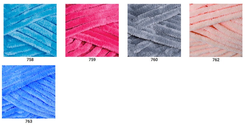 May include: Five skeins of yarn in different colors: turquoise, pink, gray, peach, and blue. The yarn is a fuzzy, chenille-like texture.