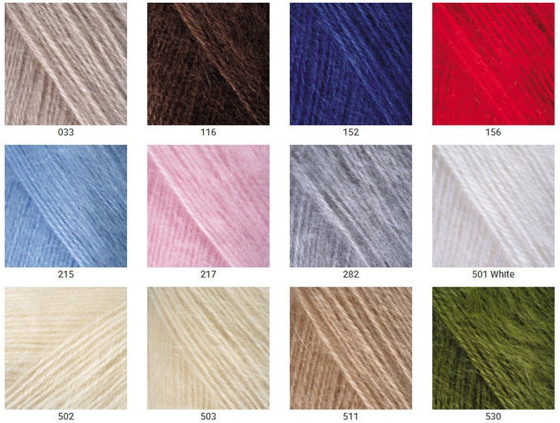 May include: A collection of yarn skeins in various colors, including beige, brown, blue, red, light blue, pink, gray, white, cream, and green. The skeins are labeled with numbers, including 033, 116, 152, 156, 215, 217, 282, 501 White, 502, 503, 511, and 530.