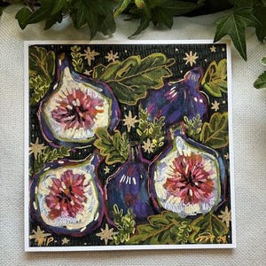 May include: A painting of five purple figs with pink centers on a black background with gold stars and green leaves.
