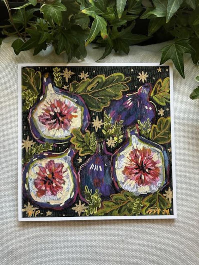 May include: A painting of five purple figs with pink centers on a black background with gold stars and green leaves.