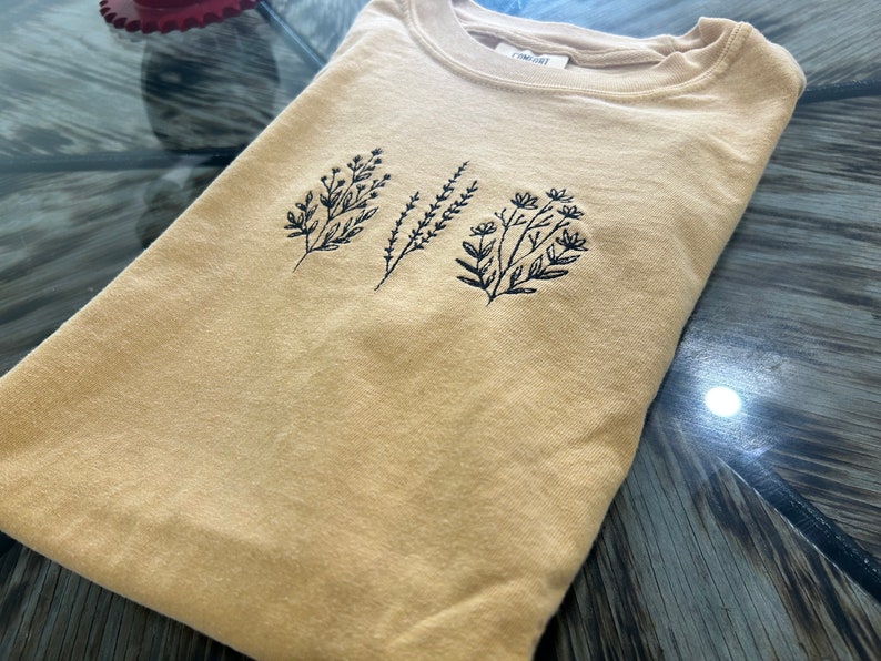 Floral embroidered t-shirt
comfort colors tshirt with embroidery
wild flower embroidery tshirts