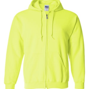 May include: A neon yellow zip-up hooded sweatshirt. The sweatshirt has a hood with drawstrings, a full-length zipper, and two front pockets. The brand tag is visible on the inside of the hood. The material appears to be a medium-weight fabric.