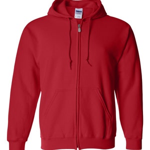 May include: A solid red zip-up hooded sweatshirt with a front pocket and a drawstring hood. The sweatshirt has a zipper closure and a tag on the inside of the hood. The material appears to be a soft, comfortable fabric.