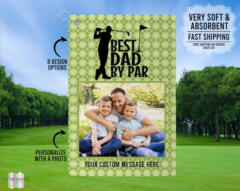 May include: Green and white golf towel with a photo of a family of three. The towel has the text "Best Dad By Par" and a silhouette of a golfer.