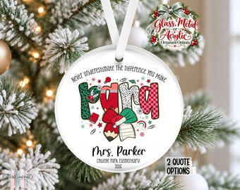 May include: A round white ornament hanging by a white ribbon, featuring the text Never Underestimate The Difference You Make, Mrs. Parker, College Park Elementary, 2026, and a colorful graphic of the word PARA with a pencil and bow design.