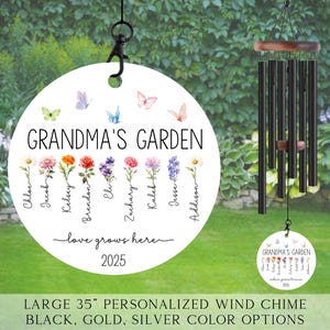 May include: A white personalized wind chime with a 35 inch diameter. The chime features a floral design with the text "Grandma's Garden" and "love grows here". The chime also includes the year 2025 and a list of names. The chime is available in black, gold, or silver.