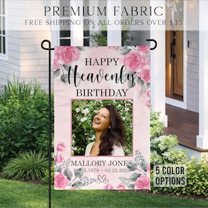 May include: A rectangular garden flag featuring a soft pink background with watercolor-style pink roses and green leaves. The text reads HAPPY Heavenly BIRTHDAY, MALLORY JONES, and 08.25.1978 ~ 03.25.2023, with a central photo of a smiling person.