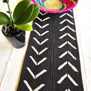 May include: A set of three ceramic mugs with a speckled, matte finish. The mugs are in shades of cream, light gray, and dark gray. Each mug has a simple, minimalist design, perfect for coffee or tea.