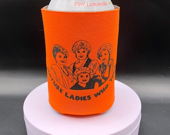 May include: Orange can cooler with a black print of four women and the text "Picture Ladies Who Th..."