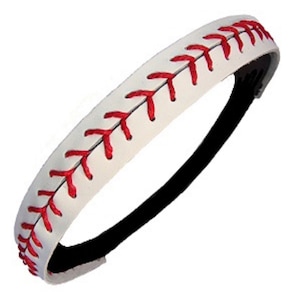 May include: White headband with red stitching that resembles a baseball. The headband is made of a soft, stretchy material.