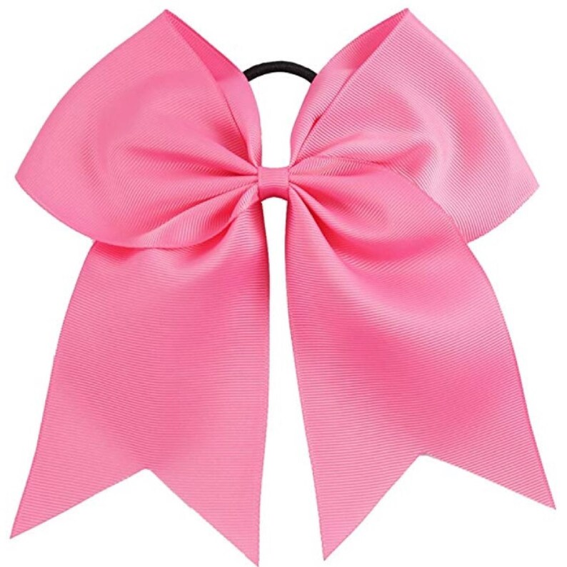 May include: A large pink cheer bow with a black elastic hair tie.