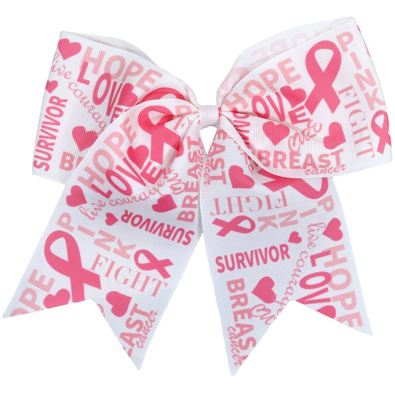 May include: White ribbon hair bow with pink ribbon accents and pink text that says "HOPE", "LOVE", "LIVE", "COURAGE", "SURVIVOR", "BREAST CANCER", "FIGHT", "PINK", "ISA", and "BREAST".